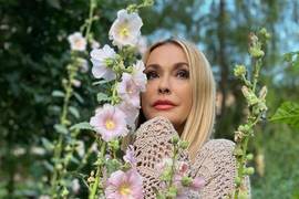 Сумская показала, как отгоняет печальные мысли в пальто ручной вязки
