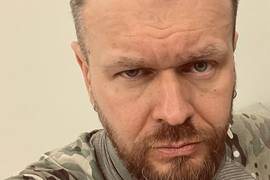 "Пережил публичные казни": Положинский написал стих о войне, желаниях, котах и собаках